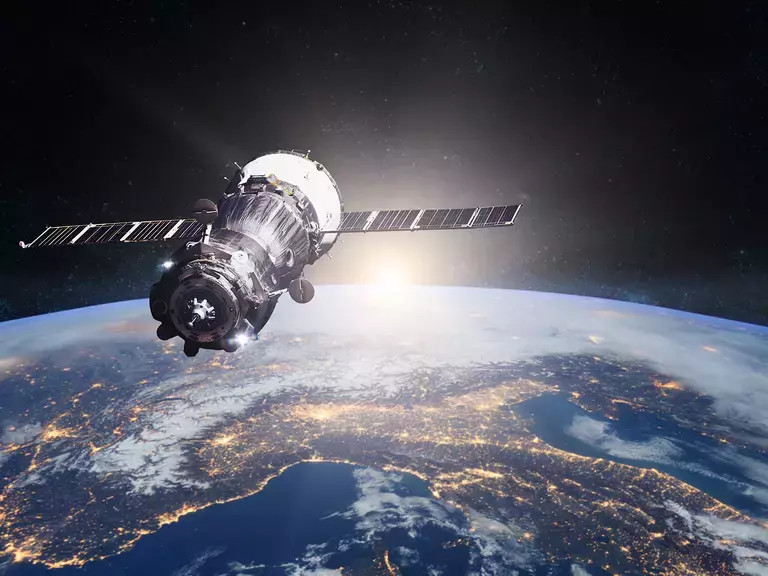 Satellite floating above the earth for space communications using fiber optics